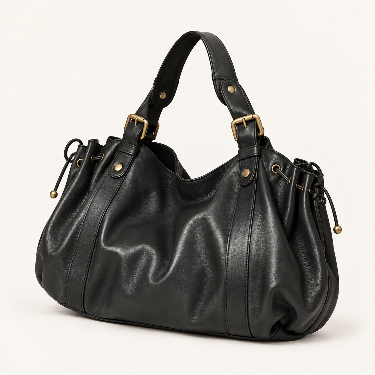Valen Hobo in Classic Black, three-quarter view showing the gathered sides and shoulder strap.