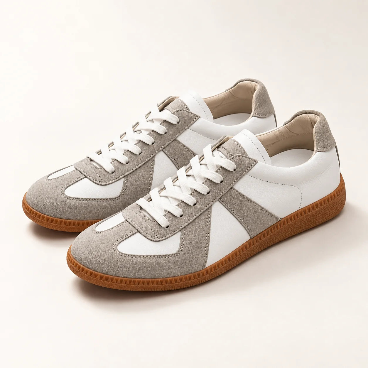 The Valen Trainer pair in ivory and grey