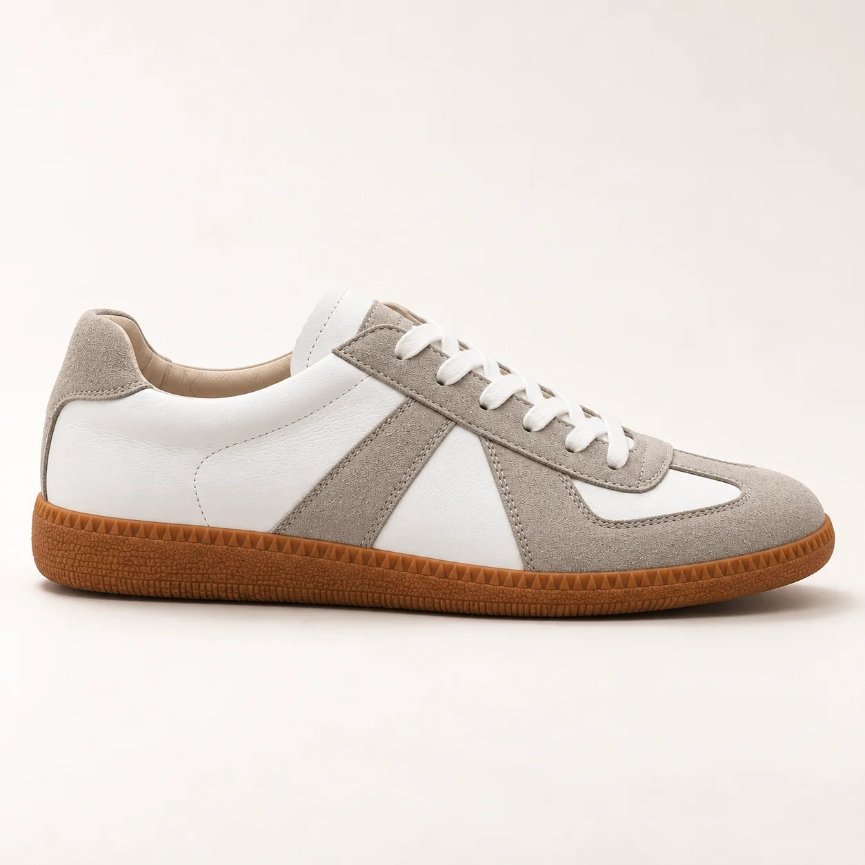 The Valen Trainer in ivory and grey